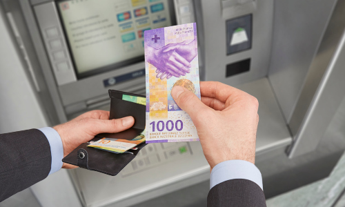 Bankomat-Szene 1000-Franken-Note 